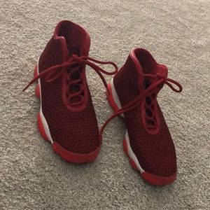 selling brightly colored red Jordan’s